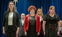 From left, Lt. Col. Erin Krizek (Ret.), Cmdr. Blake Dremann (Ret.), Sgt. 1st Class Catherine Schmid (Ret.), Col. Bree Fram (Ret.), and Chief Petty Officer Jaida McGuire (Ret.) stand during their military retirement ceremony at the Human Rights Campaign Headquarters, Thursday, Jan. 8, 2026 in Washington. (Kevin Wolf/AP Content Services for Human Rights Campaign)