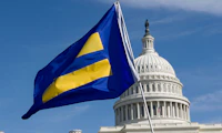 United States Capitol in the background with the HRC equality flag.