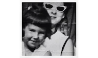 Joni Madison as a young girl and her mom in a photo booth